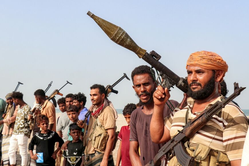 Fighters supporting the Aden-based internationally-recognised Yemeni government gather during a vigil along the Red Sea shore in Khokha, in Yemen's western Hodeidah province on July 20, 2026, calling for a resumption of hostilities with the Houthi group.