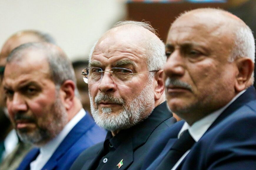 Iran's Parliament Speaker Mohammad Bagher Ghalibaf, middle, threatened to up the intensity of Iranian strikes