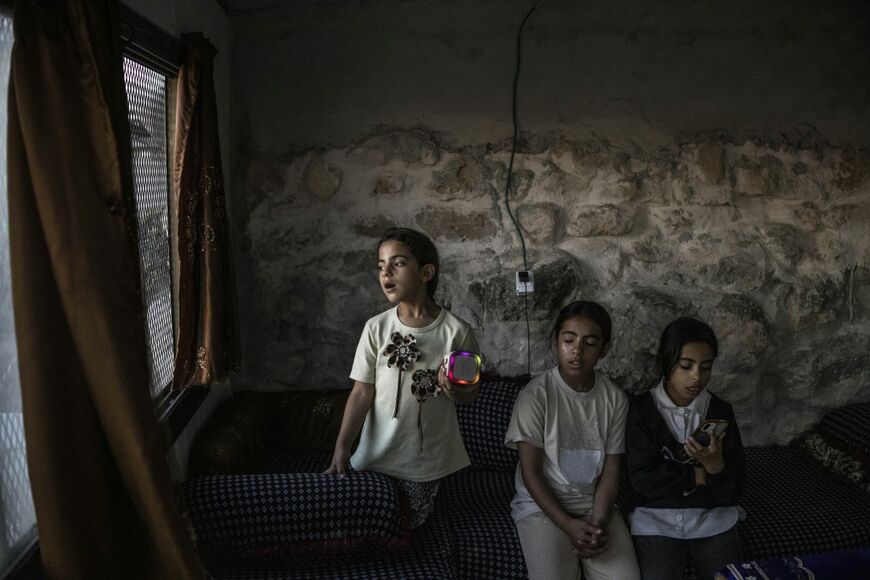 "Now, we have sought refuge in the cave. Since it has existed since ancient times they cannot demolish it," Fatima Emar says