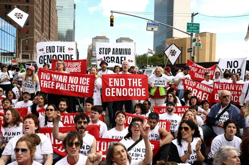 Several hundred protesters, some brandishing "stop the genocide" banners, gathered near the UN before his speech, with some carrying out acts of civil disobedience