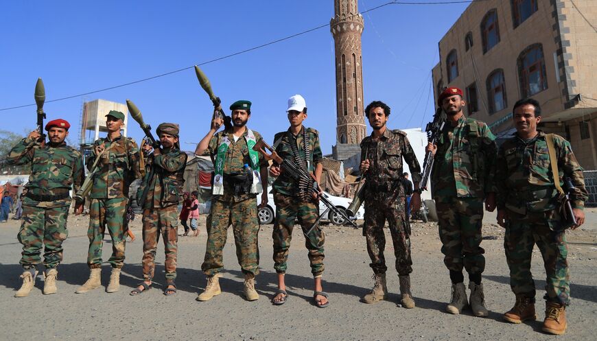Fighters loyal to the Houthi authorities, gather during a rally to recruit more fighters, in Sanaa on September 10, 2026.