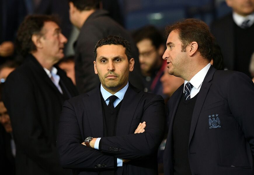 Manchester City chairman Khaldoon Al Mubarak (L) and chief executive Ferran Soriano at a Champions League match in Paris