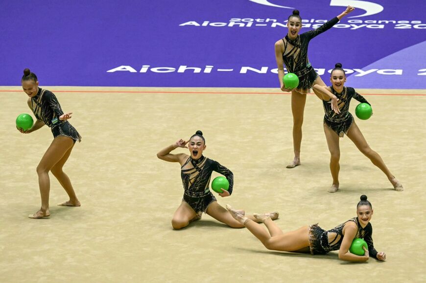 Uzbekistan's team competes in the group all-round rhythmic gymnastics final