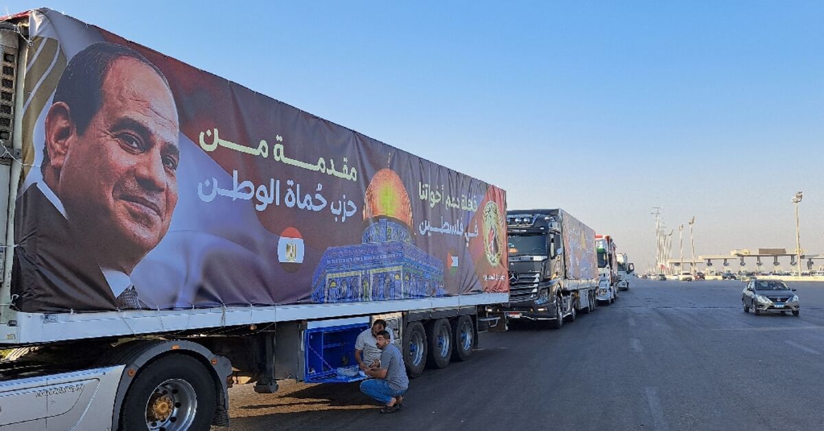 Aid trucks wait at Egypt's border with war-torn Gaza after deal - AL ...