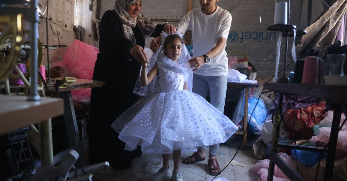 Gaza tailor turns waste fabrics into dresses for girls