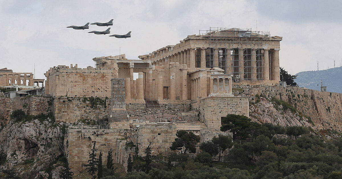 FILE PHOTO: Military planes fly above the Acropolis of Athens, as part of a military parade marking the country’s Independence Day, in Athens, Greece, March 25, 2026. REUTERS/Louisa Gouliamaki/File Photo