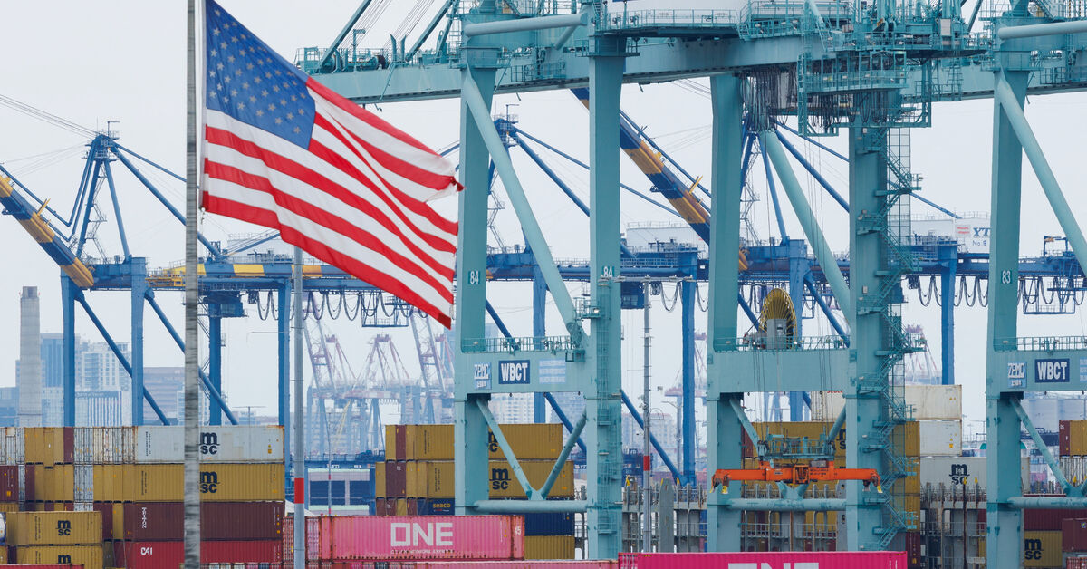 FILE PHOTO: Shipping containers from China sit at the Port of Los Angeles in San Pedro, California, U.S., November 5, 2025. REUTERS/Mike Blake/File Photo