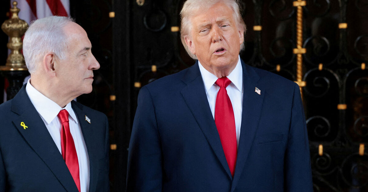 FILE PHOTO: U.S. President Donald Trump speaks next to Israeli Prime Minister Benjamin Netanyahu upon arrival for meetings at Trump's Mar-a-Lago club in Palm Beach, Florida, U.S., December 29, 2025. REUTERS/Jonathan Ernst/File Photo