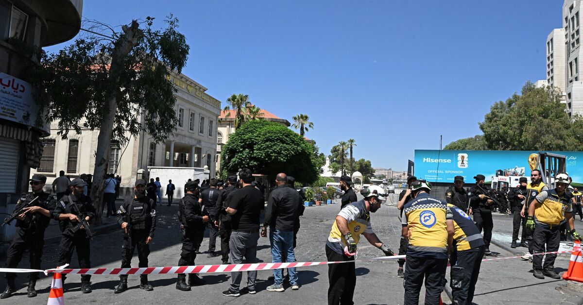Two explosions in Damascus as Macron visits Syria 