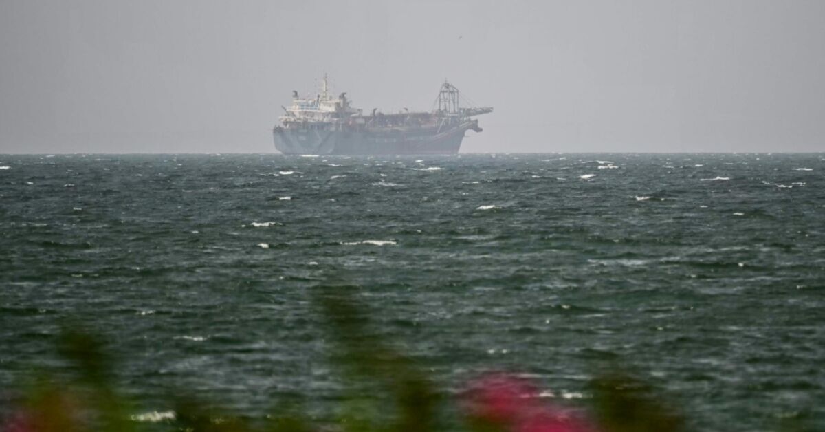 A vessel is seen off the coast of Sharjah in the United Arab Emirates on August 3