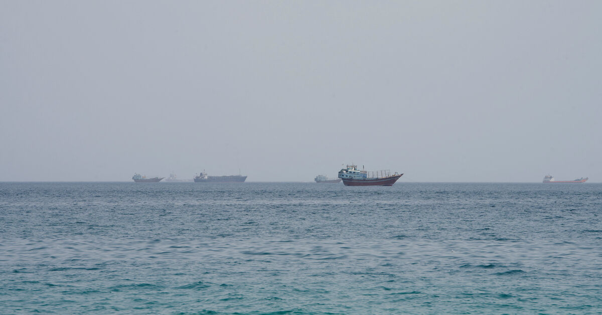 Vessels near the Strait of Hormuz, as seen from Musandam, Oman, August 10, 2026. REUTERS/Stringer