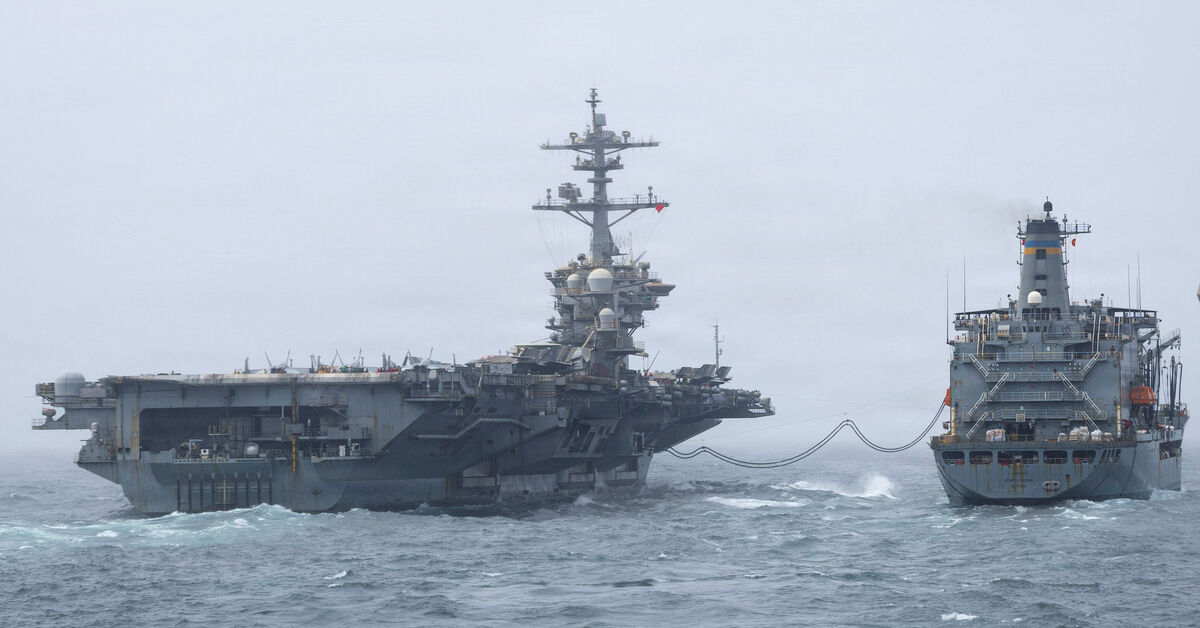 FILE PHOTO: The U.S. Navy Nimitz-class aircraft carrier USS Abraham Lincoln, which is supporting U.S. military operations in the war with Iran, conducts a replenishment-at-sea with fleet replenishment oiler USNS Henry J. Kaiser, August 16, 2026. U.S. Navy/Handout via REUTERS/ File Photo
