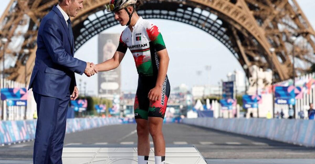 Afghan cyclist Hashimi competes after disguising as a man