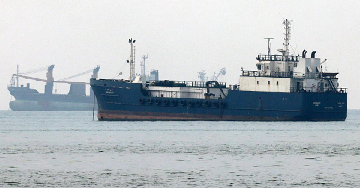 Vessels transit the Hormuz Strait off the coast of Iran's southern port city of Bandar Abbas on September 7, 2026