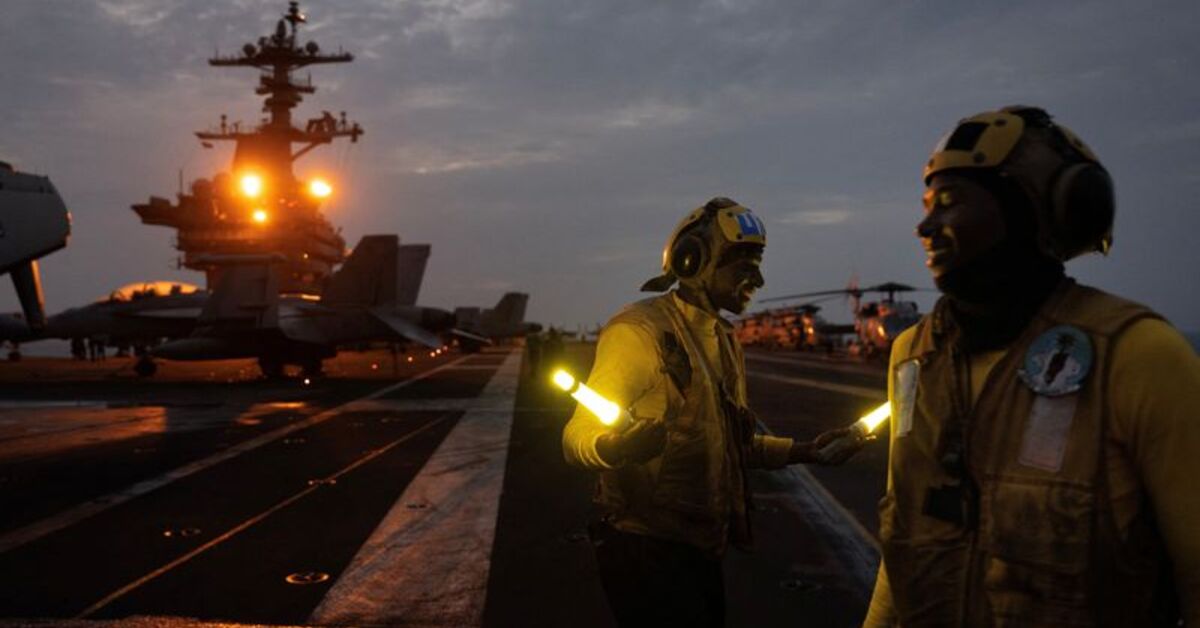 Sailors aboard USS George Washington adjust to simulated war with Iran
