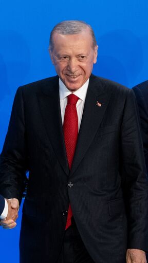 President Joe Biden and NATO Secretary General Jens Stoltenberg greet Turkish President Recep Tayyip Erdogan on stage before a group photo during the 2024 NATO summit on July 10, 2024, in Washington, DC. 